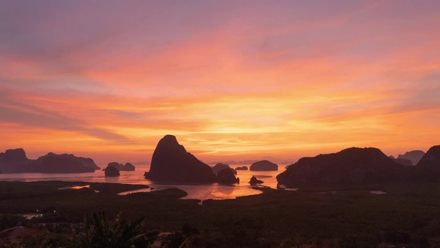 Night to day time lapse of Samet Nangshe Viewpoint at sunset with Andaman sea in Phang Nga Bay, tourist attraction in summer, Thailand in travel trip and holidays vacation. Natural landscape.