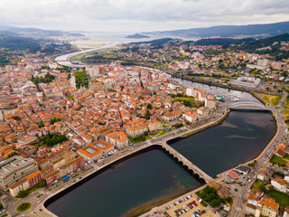 Fototapeta na wymiar Panoramic view from drone on the city center Pontevedra with embankment of the river Rio Lerez. Galicia. Spain