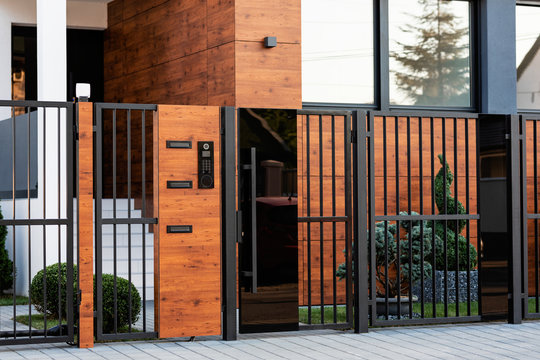 Modern house exterior with safety gate.