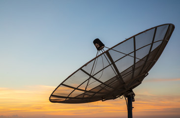 Satellite dish at sunset