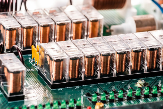 Wire is connected to a large green microcircuit