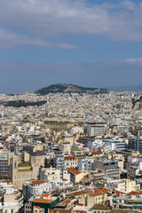 Athens cityscape, and Lycabettus Hill with blue sky