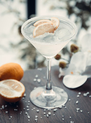 white martini with lemon slices