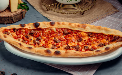 traditional turkish meat pide on the table