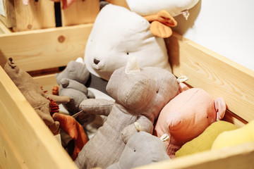 Soft cute handmade toys in wooden box