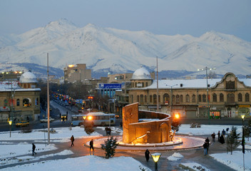 Imam Khomeini Square and Alvand Mountain (3580 m) on the background. Hamadan, Iran.