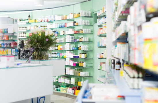 Different medicines on the shelves in the pharmaceutical  store