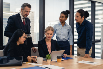 Corporate business team and manager in a meeting.Young team of coworkers making great business...