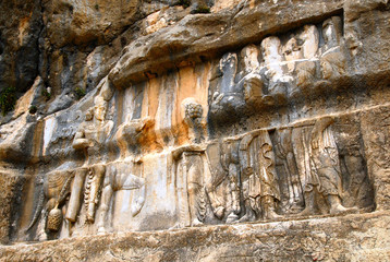 Bas-relief of ancien persian king Shapur I commemorating his victory over Romans. Bishapur ancient city area. Iran.