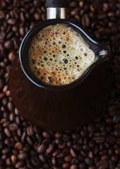 Fresh and tasty coffee in the Turka and coffee beans