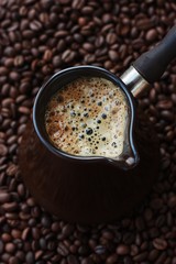 Fresh and tasty coffee in the Turka and coffee beans