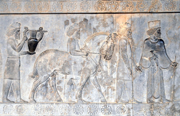 Ancient relief. Persepolis (6th-4th century BC), capital of the Achaemenid Empire (World Heritage Site since 1979), Iran.