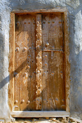 Old wooden door. Fishing village of Laft. Qeshm Island, Iran.