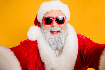 Funny funky santa claus blogger make selfie in blog post christmas eve congratulation video call...