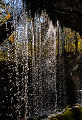 Wasserfall Tropfen Gegenlicht Herbst Sonne Berchtesgaden Nationalpark Königssee Alpen Deutschland Wasser H2O Natur Quelle rieseln Höhle Felsen Wald Natuschlutzgebiet Element Lebenselixier