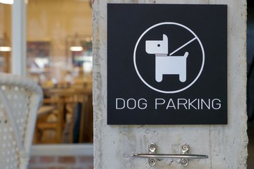 Dog parking sign beside the restaurant.