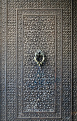 Old copper door. Old town of Kashan, Iran.