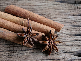 Cinnamon, herbs and spices, anise on the wooden floor