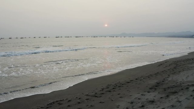 Aerial 4K drone flying over Tropical Beach of Pelabuhan Ratu in Suka Bumi, West Java, Indonesia. Drone Videos on tropical beach