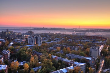 Aerial view of sun rises over summer European city