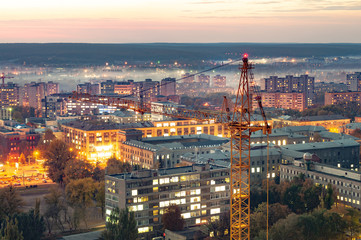 Aerial view of the beautiful burning city lights