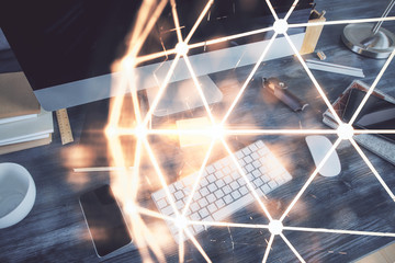 Computer on desktop with social network theme icon. Multi exposure. Concept of international connections.