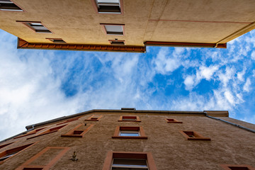 Fototapeta na wymiar Looking from the park to the sky. Sky with clouds and blue.