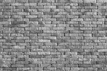 The background or wall of grunge brick in or out of building ,black and white style. 