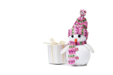 Creative snowman with gift box isolated on a white background.