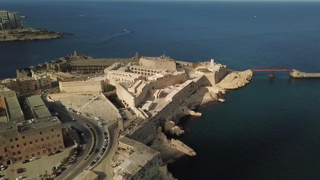 Aerial view of Valetta, Malta. Tilt down on st. Elmo Fort and bridge.