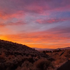 Red sky sunrise in mountains