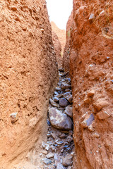 Valley eroded by rain and wind forming ravines in the red clay called Las Carcavas in Madrid