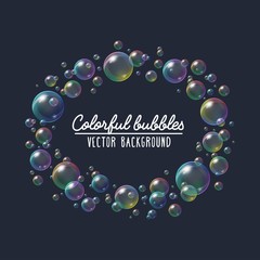 Colorful festive soap bubbles vector background. Transparent bubble blower frame with rainbow iridescent reflection illustration on navy blue for your design