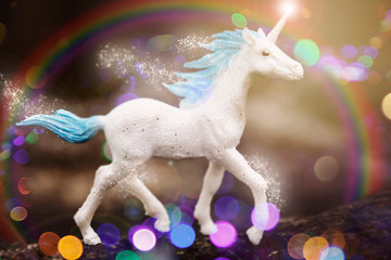Cute unicorn walking in the sparkling rainbow - 298091872