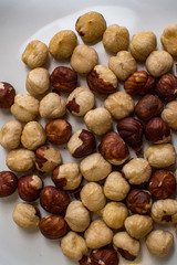 hazelnuts on white background