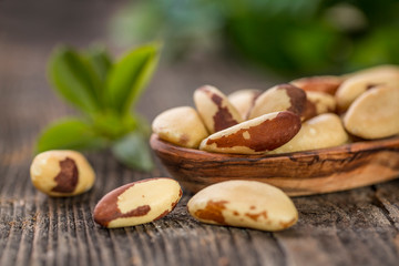 Bertholletia.Brazil nuts on wooden texture