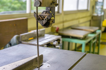 Old jig Saw table holding manual jig saw