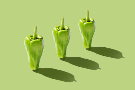 Fresh padron pepper on green background. Vibrant colorful pattern