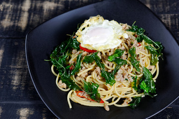 Spaghetti with minced pork basil with fried eggs (Pad Kra Pao kai dao)