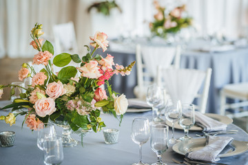 Luxury wedding table decoration. Special event table set up. Fresh flower decoration. Pastel colors - blue and pink decoration