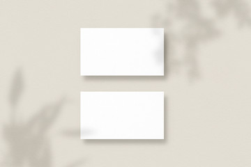 Mockup of two horizontal business cards with soft shadows. Blank business cards. Template for branding identity. Photo mockup with clipping path.