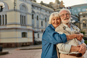 True love has no expiration date. Portrait of cheerful senior couple in casual clothing embracing...