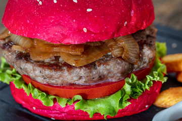 Red bread, burgers. American beefsteak burgers hamburgers pickles, ketchup, mayonnaise and fried...