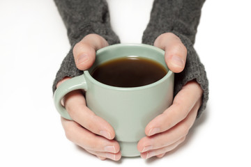 woman holding a cup of coffee white background