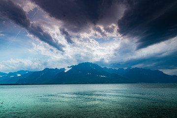 View of the mountain range,lake and the cloudy sky.Lake Geneva,mountain Alps in Montreux,canton Vaud Switzerland.
