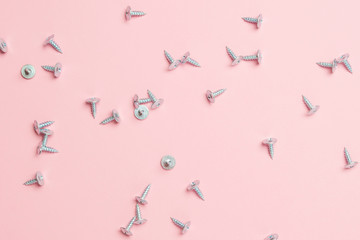 Self-tapping screws on colored background