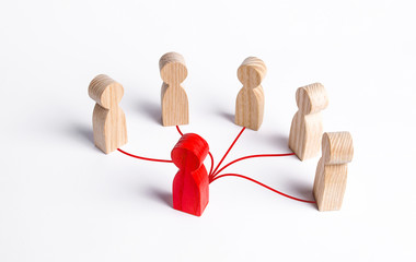 The red human figure is connected by lines with five persons. Business management. Spreading...