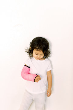 Portrait of child wearing cast