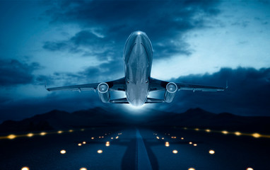 Jet plane in flight with dark blue