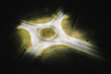Empty roundabout at night